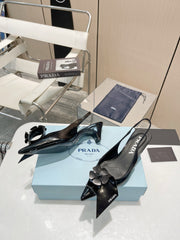 SLINGBACK KITTEN HEEL IN BLACK SHINY CALFSKIN ATTACHED FLOWERS