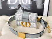 MONTAIGNE 19 HANDBAG IN GREY CALFSKIN