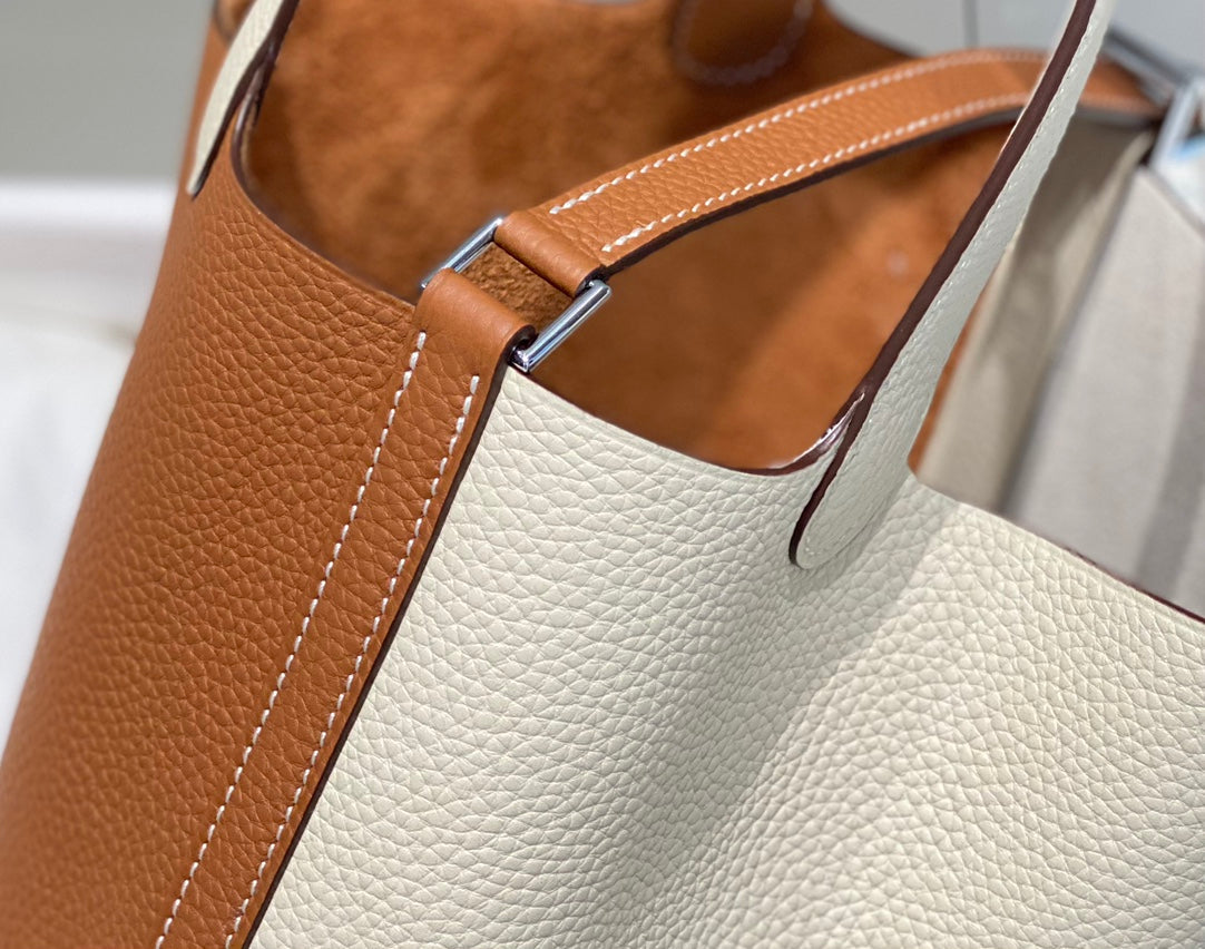 HERMES 25S PICOTIN LOCK 18 IN WHITE AND BROWN CALFSKIN SILVER HARDWARE