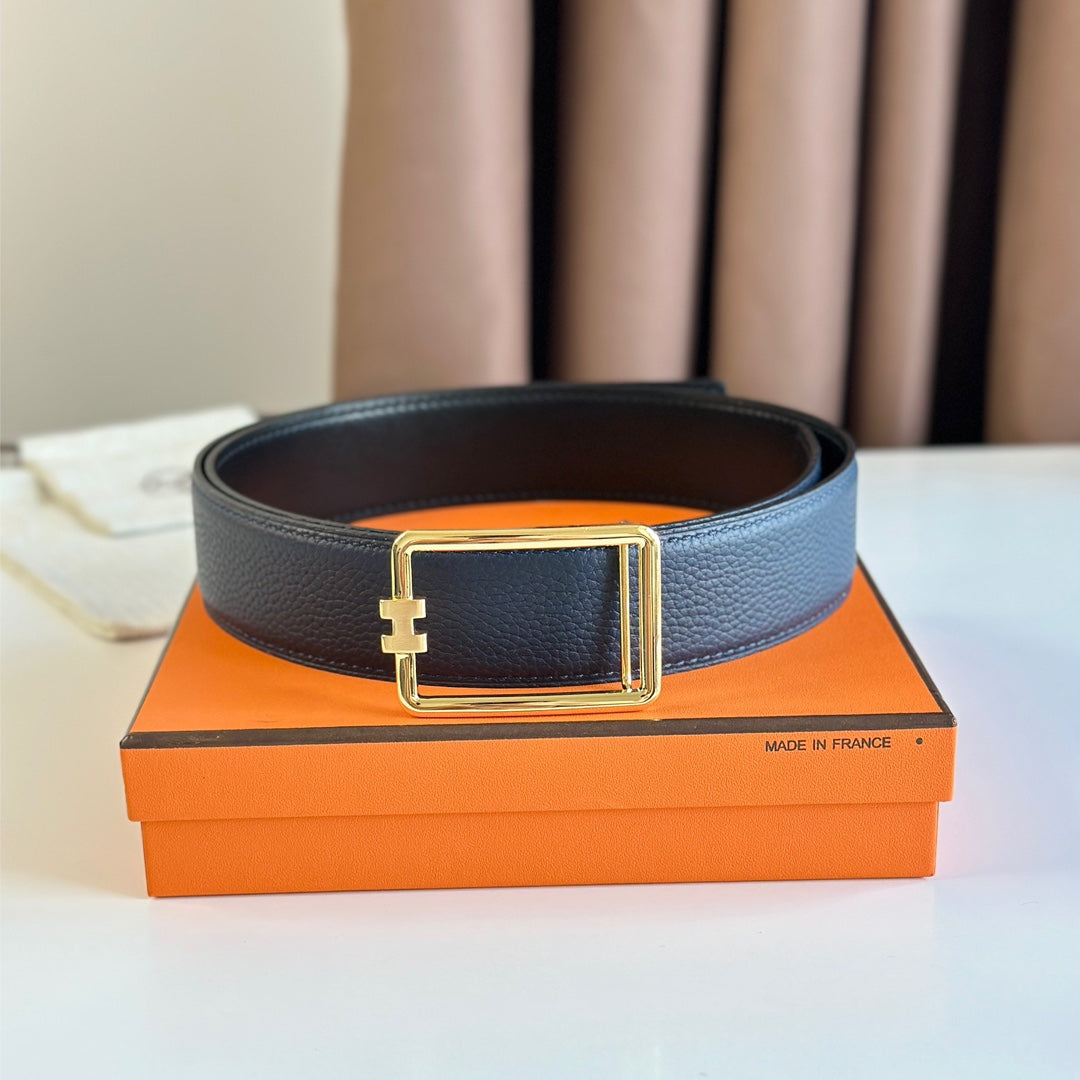HM TUBE H BELT BUCKLE & REVERSIBLE BLACK AND AEGEAN BLUE LEATHER STRAP 38MM GOLD HARDWARE
