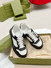 GG EMBOSSED TRAINER BLACK AND WHITE CALFSKIN