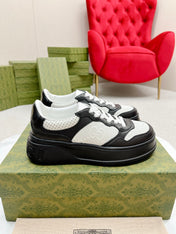 GG EMBOSSED TRAINER BLACK AND WHITE CALFSKIN