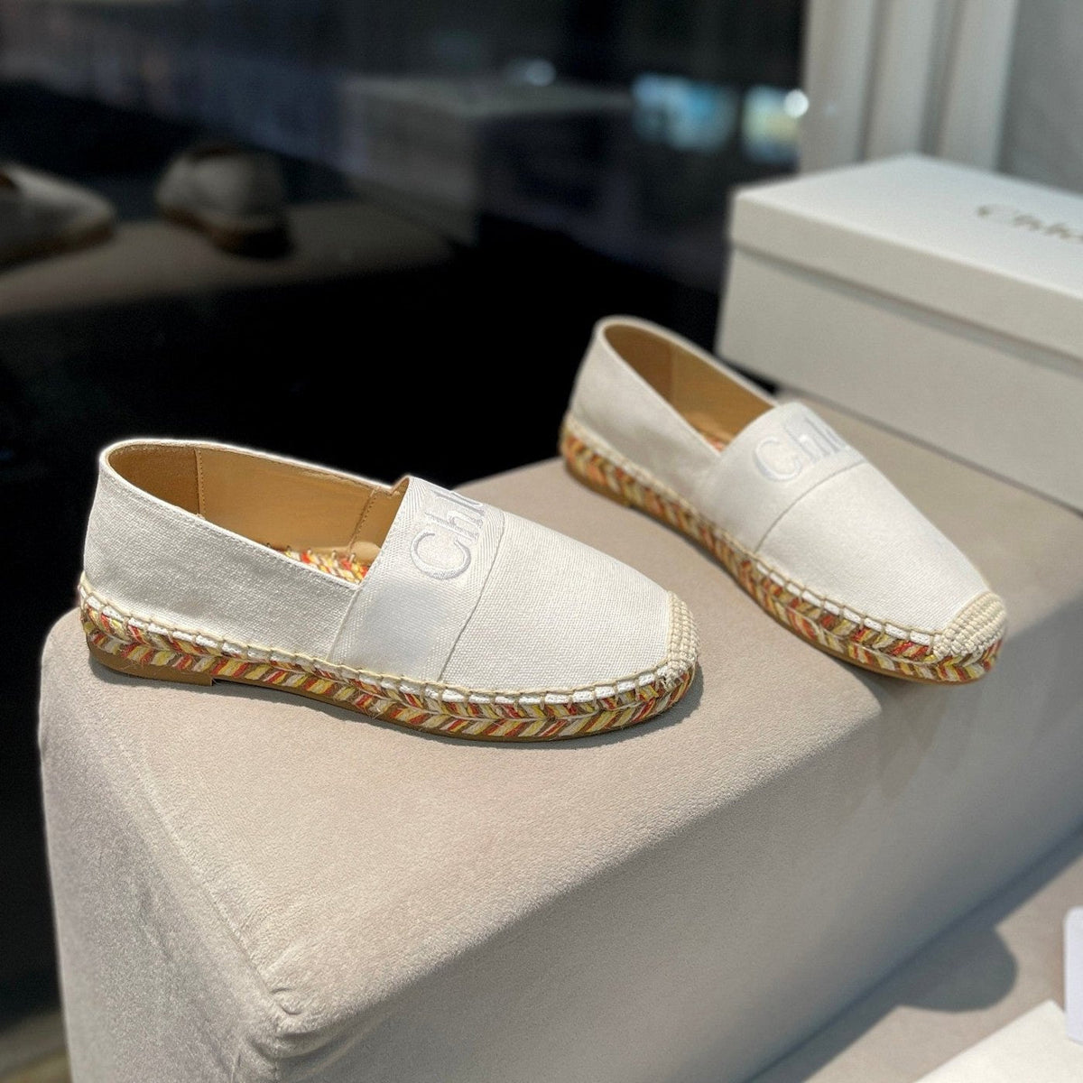 LOAFERS IN WHITE FABRIC AND RAFFIA