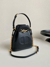 MEDIUM C'EST 24 IN BLACK CD-EMBOSSED CALFSKIN