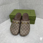 MULE WITH GOLD HORSEBIT IN BEIGE AND EBONY MONOGRAM CANVAS