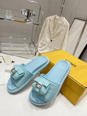 FENDI BAGUETTE SLIPPERS IN SKY BLUE LAMBSKIN WITH GOLD HARDWARE