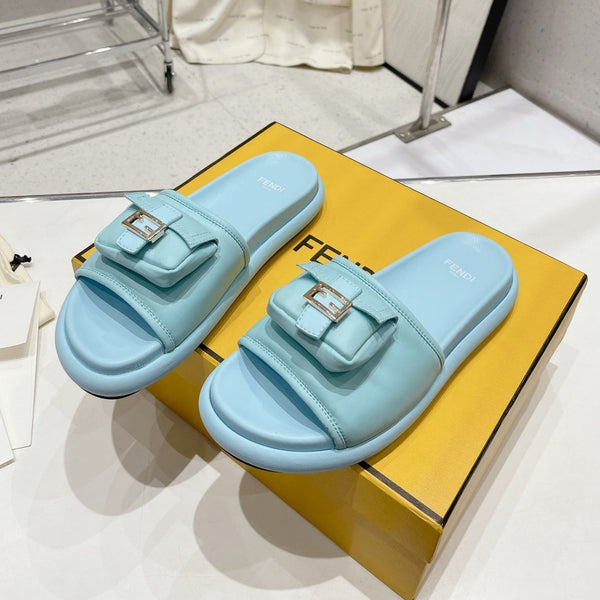 FENDI BAGUETTE SLIPPERS IN SKY BLUE LAMBSKIN WITH GOLD HARDWARE