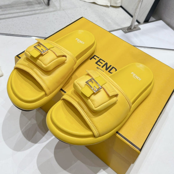 FENDI BAGUETTE SLIPPERS IN NAPLES YELLOW LAMBSKIN WITH GOLD HARDWARE