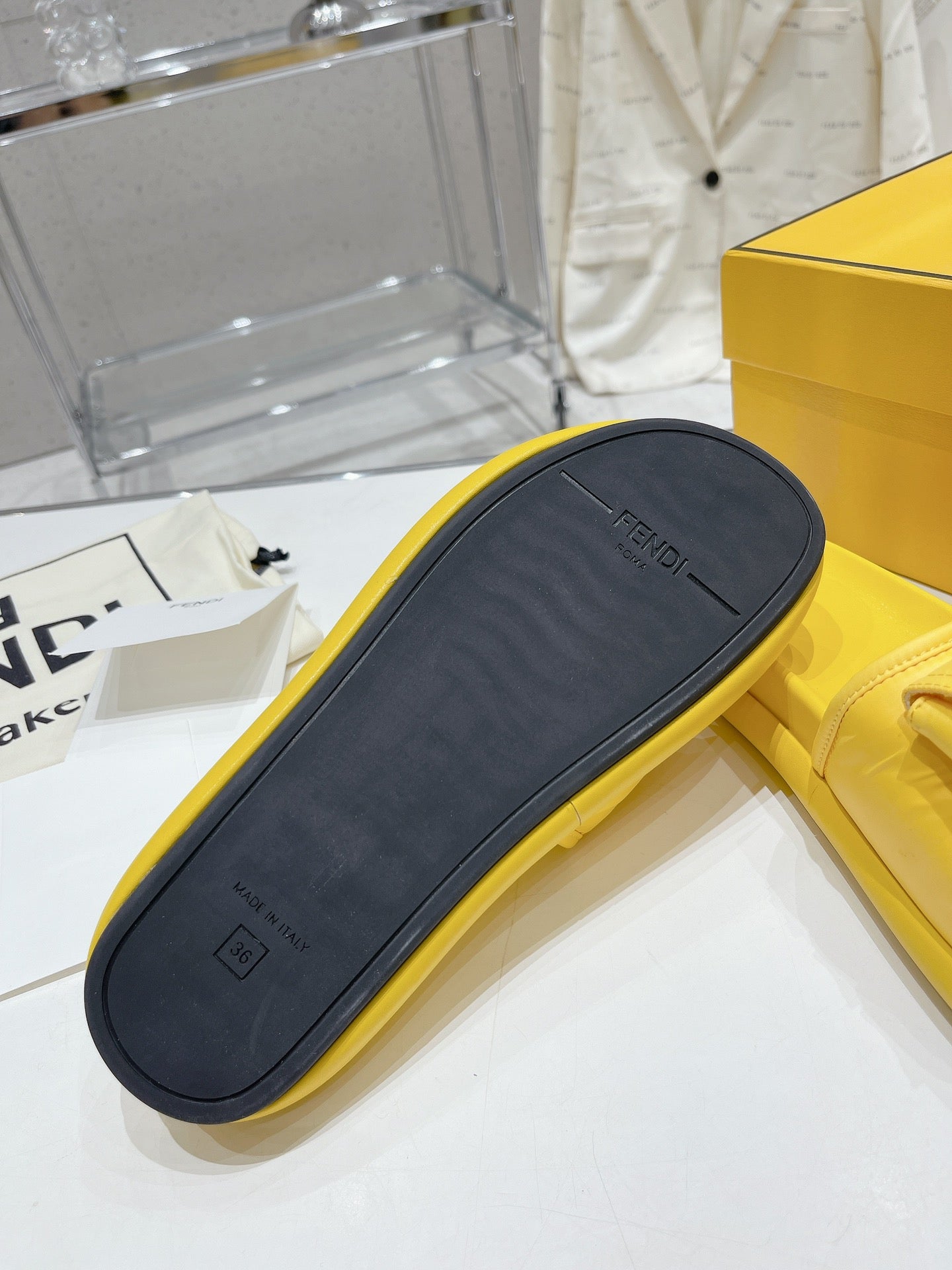 FENDI BAGUETTE SLIPPERS IN NAPLES YELLOW LAMBSKIN WITH GOLD HARDWARE