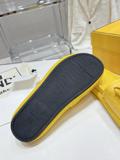 FENDI BAGUETTE SLIPPERS IN NAPLES YELLOW LAMBSKIN WITH GOLD HARDWARE
