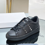 VALENTINO 25S GARAVANI ROCKSTUD UNTITLED STUDDED SNEAKERS IN BLACK LAMBSKIN
