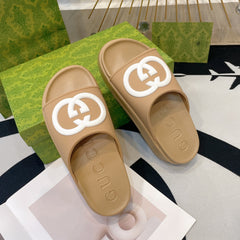 INTERLOCKING G SLIDE SANDAL IN TORTILLA BROWN IMPORTED TPU
