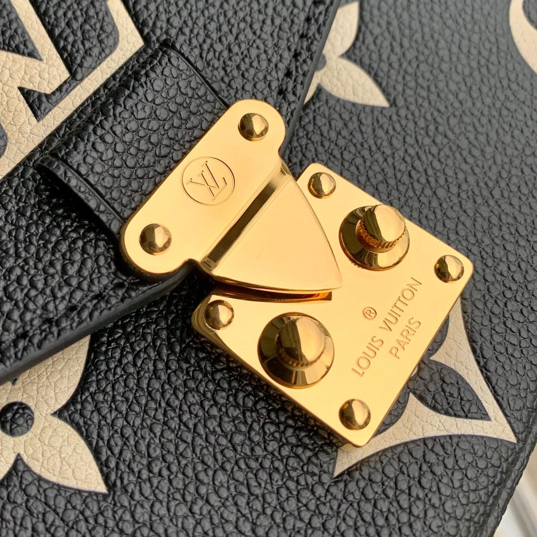 POCHETTE MÉTIS EAST WEST 21 IN BLACK AND BEIGE MONOGRAM EMPREINTE CALFSKIN EMBOSSED LOGO