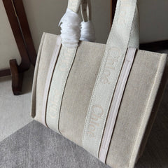 MEDIUM WOODY TOTE BAG 37 IN BEIGE LINEN CANVAS WEBBING LOGO EMBROIDER COTTON WHITE CALFSKIN