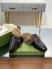 HORSEBIT MULE IN BLACK CALFSKIN AND LAMB WOOL LINING