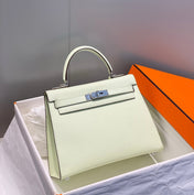 KELLY 28CM IN VERT FIZZ SWIFT CALFSKIN SILVER HARDWARE