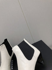 SHORT BOOTS IN WHITE MIX BLACK SHEEPSKIN