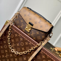 POCHETTE MÉTIS EAST WEST 21.5 IN BROWN MONOGRAM COATED CANVAS AND CALFSKIN