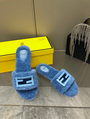 FENDI BAGUETTE SLIDE SLIPPERS IN CERULEAN BLUE WOOL