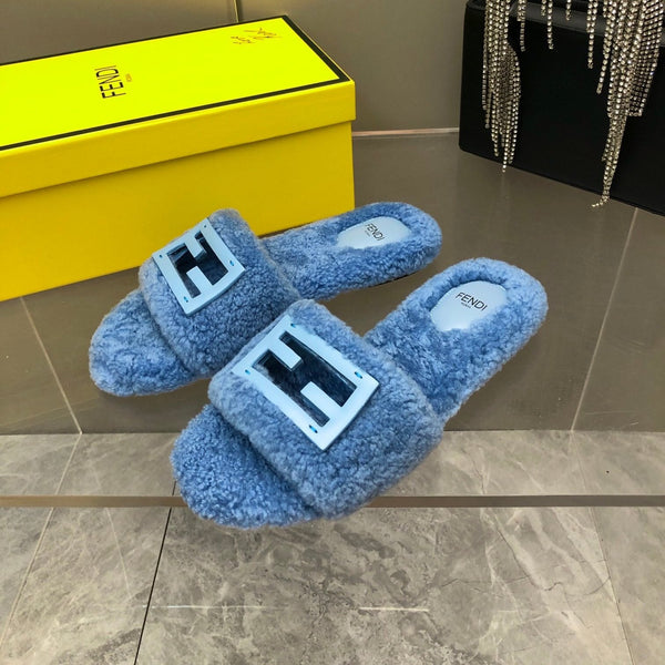 FENDI BAGUETTE SLIDE SLIPPERS IN CERULEAN BLUE WOOL