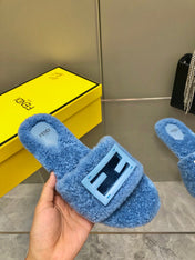 FENDI BAGUETTE SLIDE SLIPPERS IN CERULEAN BLUE WOOL