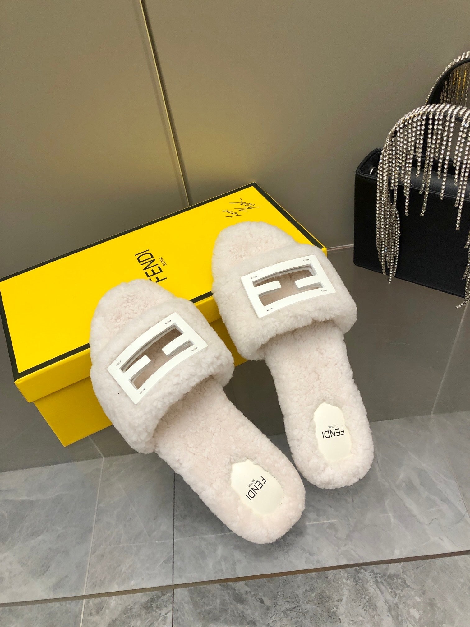 FENDI BAGUETTE SLIDE SLIPPERS IN WHITE WOOL