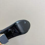 FENDI DELFINA HIGH-HEELED 85 MM SANDAL IN BLACK MONOGRAM FF CANVAS