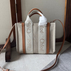 SMALL WOODY TOTE BAG 26.5 IN BEIGE LINEN CANVAS WEBBING LOGO EMBROIDERY BROWN CALFSKIN