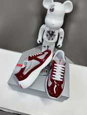 PRADA SNEAKERS IN BURDUNDY RED CALFSKIN AND MESH