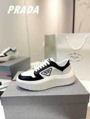 PRA DOWNTOWN THICK-SOLE SNEAKERS BLACK AND WHITE CALFSKIN