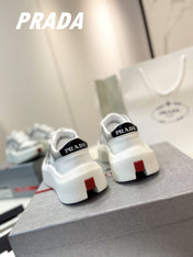 PRA DOWNTOWN THICK-SOLE SNEAKERS WHITE AND GRAY CALFSKIN