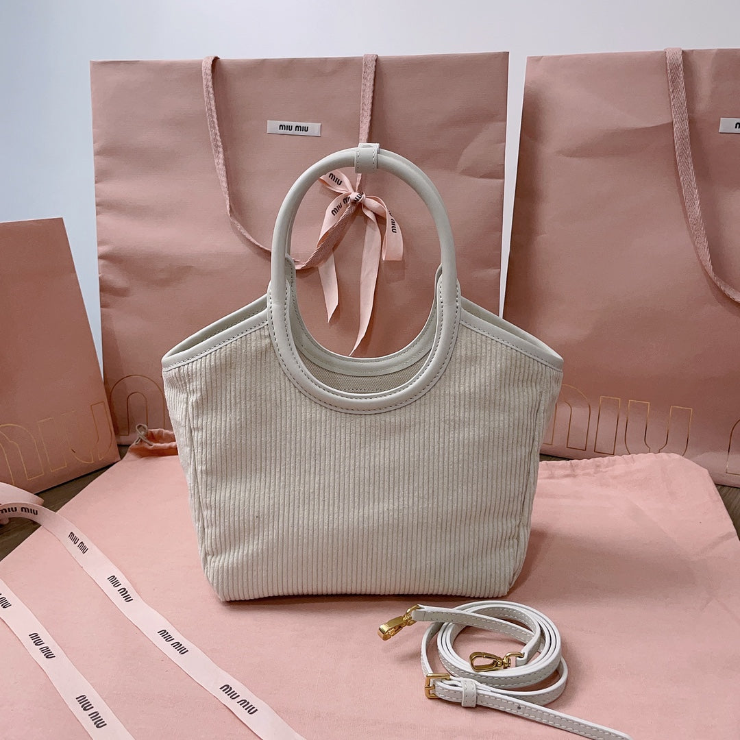 IVY HANDBAG 22 IN WHITE CANVAS