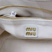 IVY HANDBAG 22 IN WHITE CANVAS