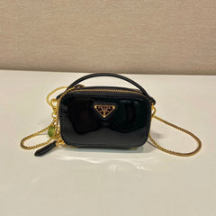 MINI HAND BAG 11 WITH GOLD STRAP IN BLACK PATENT CALFSKIN