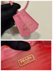BUCKET BAG 19 IN CANDY PINK RE-NYLON AND SAFFIANO LEATHER HANDLE