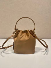 BUCKET BAG 19 IN RUSSET BROWN RE-NYLON AND CALFSKIN HANDLE