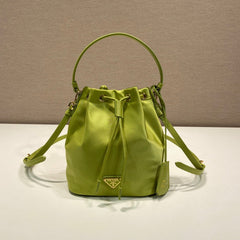 BUCKET BAG 19 IN APPLE GREEN RE-NYLON AND SAFFIANO LEATHER HANDLE