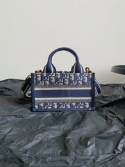 MINI BOOK TOTE 21 BLUE OBLIQUE EMBROIDERY