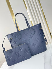 NEVERFULL MM 31 IN DARK NAVY MONOGRAM EMPREINTE LEATHER