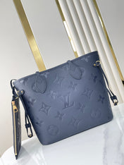 NEVERFULL MM 31 IN DARK NAVY MONOGRAM EMPREINTE LEATHER