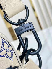 TRIO MESSENGER 25 IN CREAM BLUE MONOGRAM SHADOW CALFSKIN