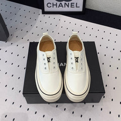 LACELESS SNEAKERS PLATFORM IN WHITE CANVAS