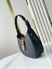LOW KEY SHOULDER BAG 26 IN BLACK GRAINED CALFSKIN GOLD BUCKLE