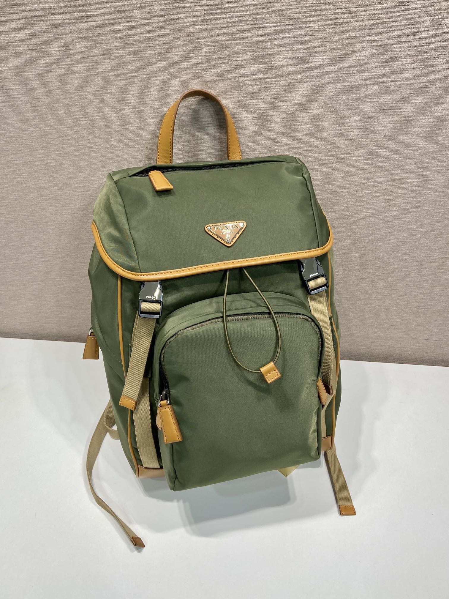 BACKPACK 45 IN SEAWEED GREEN RE-NYLON AND BROWN CALFSKIN TRIM