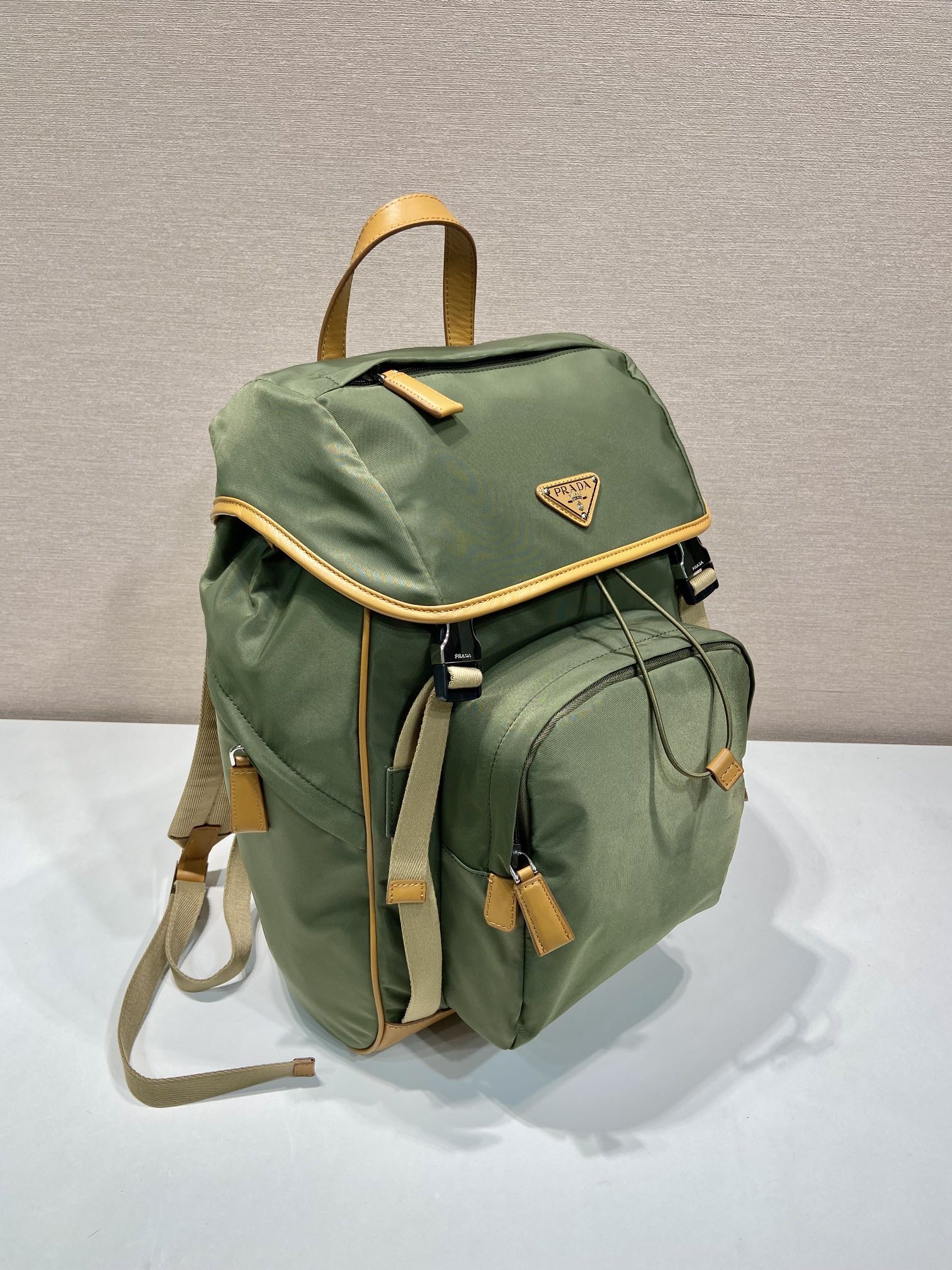 BACKPACK 45 IN SEAWEED GREEN RE-NYLON AND BROWN CALFSKIN TRIM