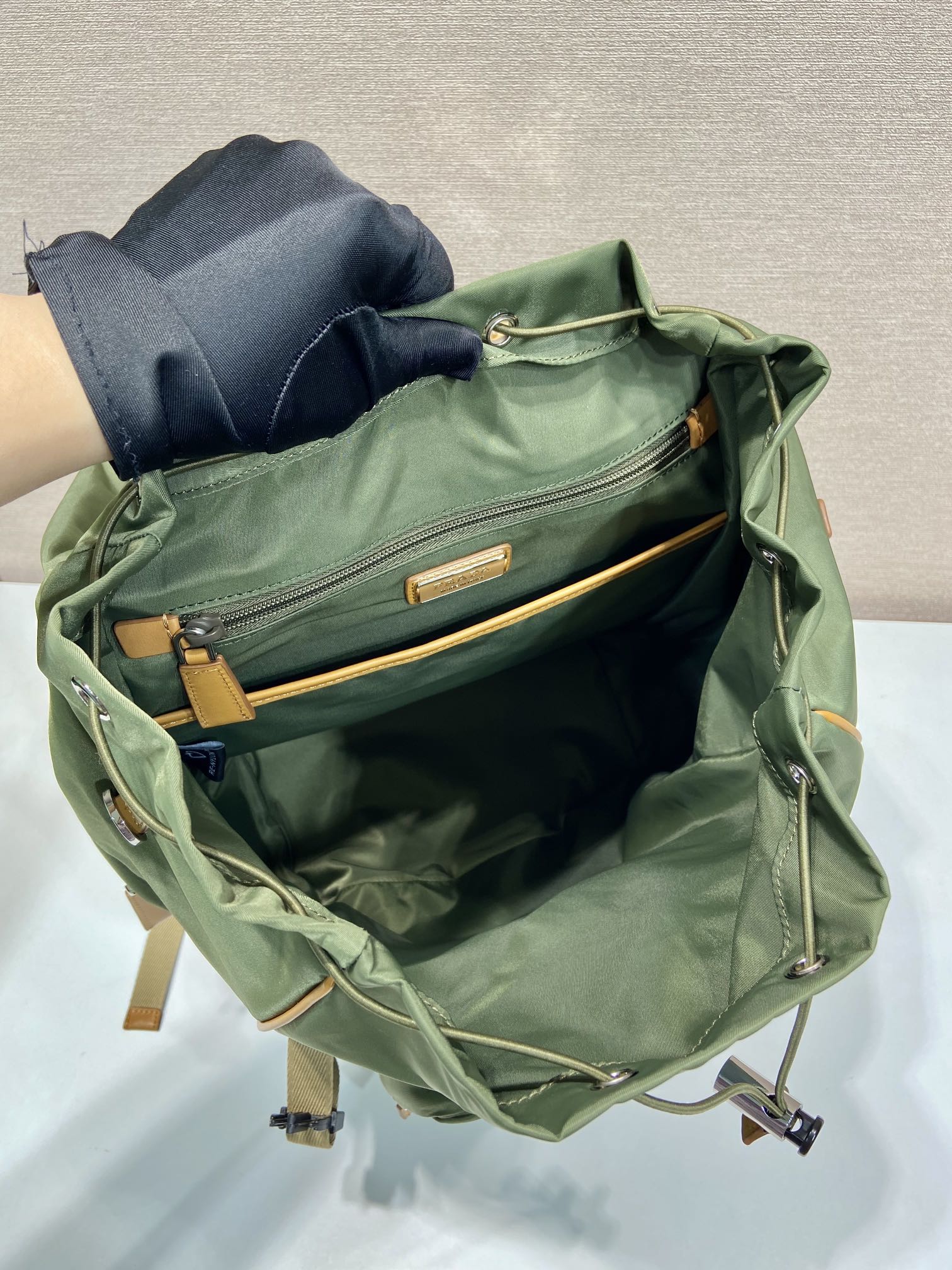 BACKPACK 45 IN SEAWEED GREEN RE-NYLON AND BROWN CALFSKIN TRIM
