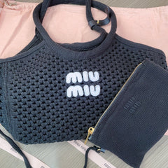 HOLLOW KNITTED SHOPPING BAG 28 IN BLACK MIX WHITE WOOL