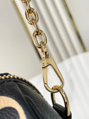 SPEEDY BANDOULIÈRE 20 IN BLACK CREAM MONOGRAM EMPREINTE LEATHER GOLD HARDWARE