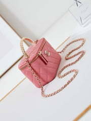 CHANEL 25S MINI VANITY BAG 16 CM IN PEACHY PINK LAMBSKIN WITH CRYSTAL-EMBELLISHED CC LOGO