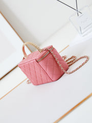 CHANEL 25S MINI VANITY BAG 16 CM IN PEACHY PINK LAMBSKIN WITH CRYSTAL-EMBELLISHED CC LOGO